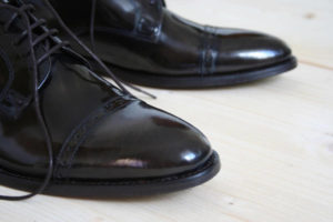 Club membership for business shoes close-up